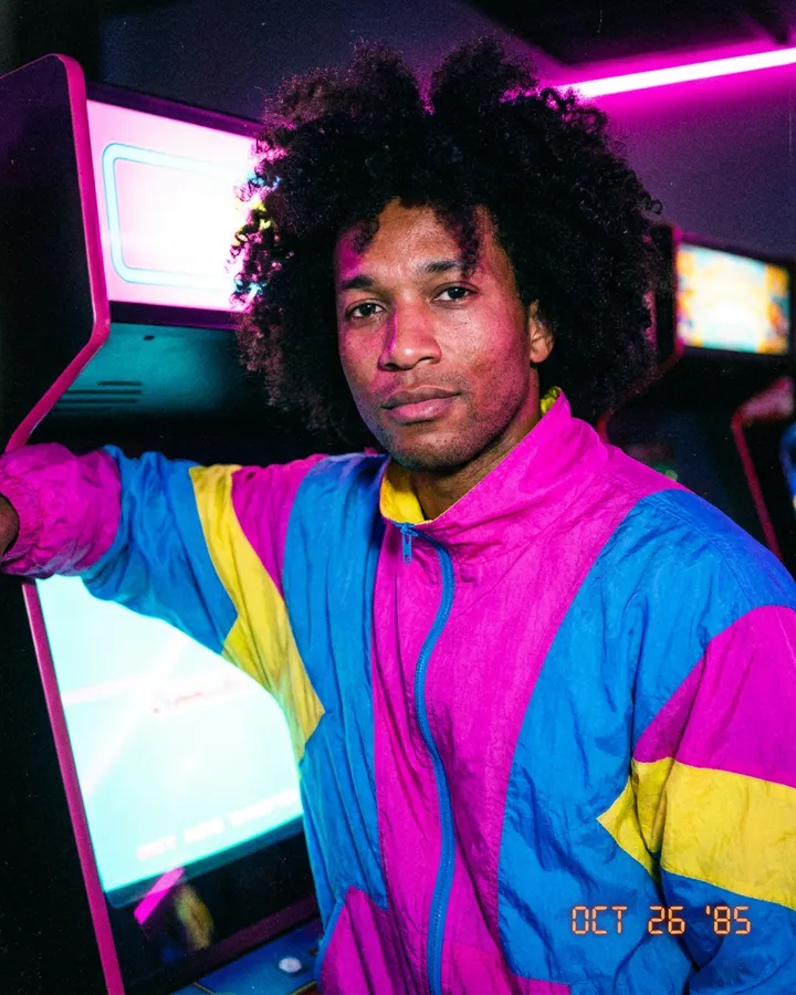 Example frame from the "80s arcade night" AI trend